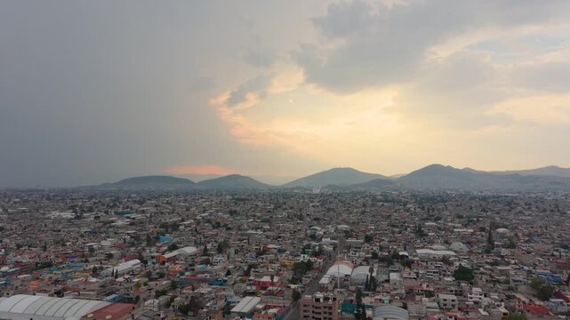 Sunset aerial of urban sprawl in Mexico City and Ecatepec