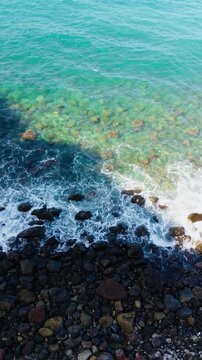 Atlantic Ocean waves washing the coast of Tenerife, Spain. Aerial landscape.