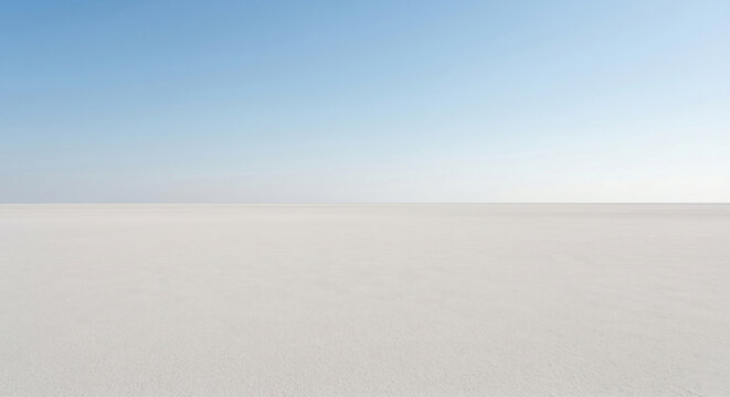 青い空と地平線が広がるミニマルな白い砂漠の風景（AI生成）
Minimalist white desert landscape with blue sky and horizon (Generative AI)