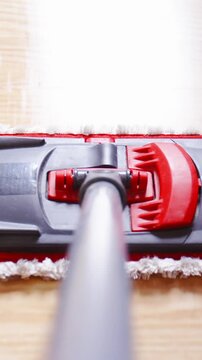 Microfiber Dust Wet Mop move around the floor close-up pole POV