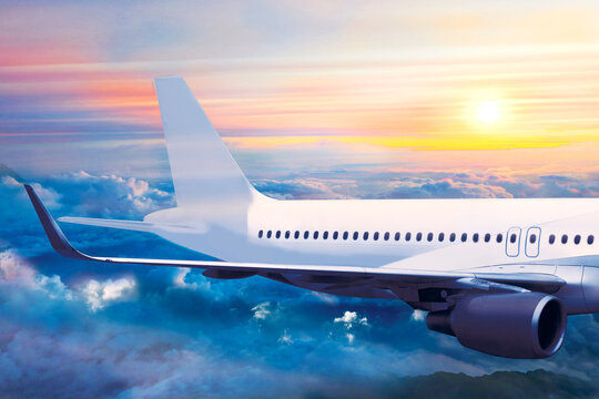 Passenger plane flight above clouds. Airplane wing side view with empty space mockup