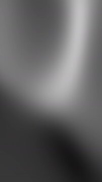Abstract black and silver gradient motion background with soft metallic light reflections. Perfect for corporate presentations, technology branding, luxury product videos, and modern marketing media