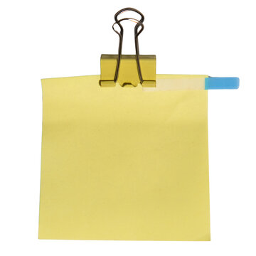 Yellow Sticky Note with Binder Clip on White