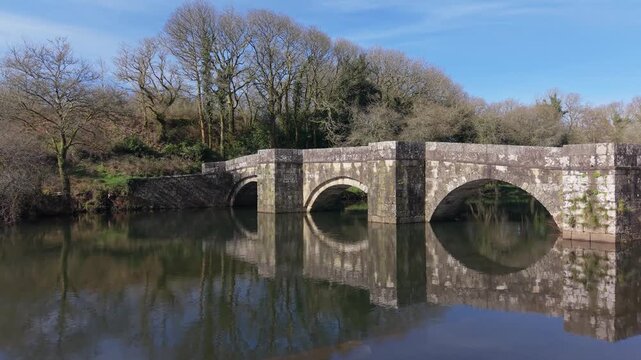 Tranquil View Of Brandomil Bridge (Ponte Romana de Brandomil) In Zas, Galicia, Spain. Aerial Zoom In Shot 