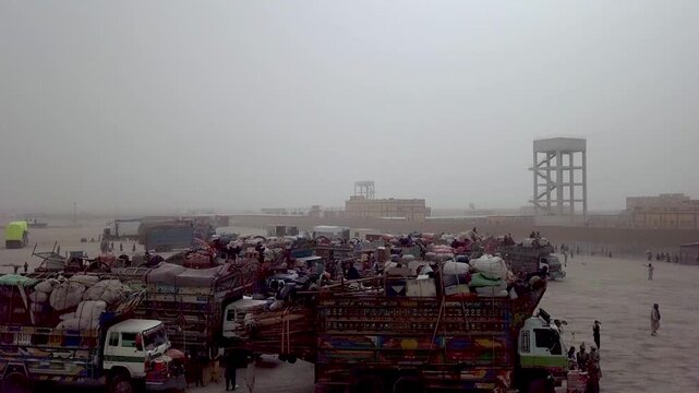 Cargo trucks at Bab-e-Dosti border crossing in Chaman captured in aerial shot, Pakistan