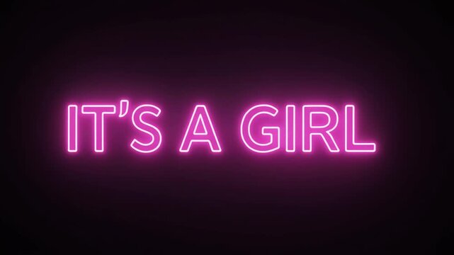 Pink neon sign glowing in the dark, displaying the text "IT'S A GIRL" for a gender reveal celebration.