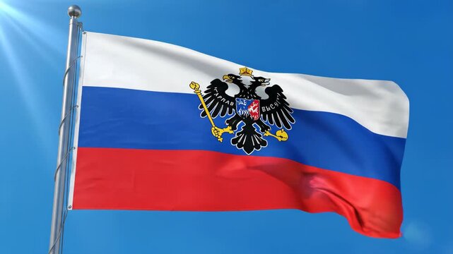 Russian Flag with Double Headed Eagle Emblem Waving Against Blue Sky
