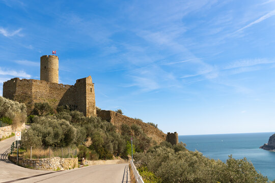 Panoramic view Monte Ursino Castle. Noli, Liguria, province of Savona. Monte Ursino Castle stands in a dominant position on a hill from which it takes its name, defending the historic center of Noli.
