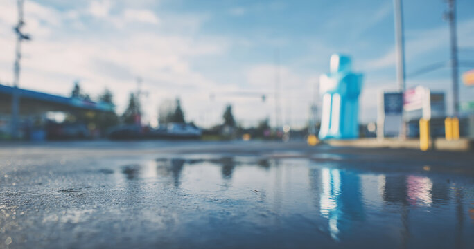 Urban street puddle with blurred background