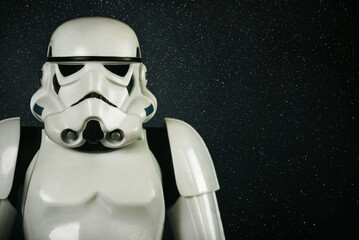 Naklejka premium Closeup of Star Wars Stormtrooper action figure character from the Star Wars movie saga and space for text. Illustrative editorial