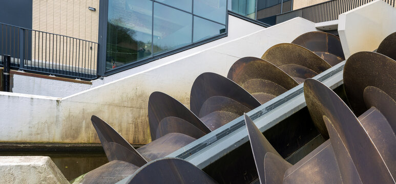 Water lifting technology to evacuate water from a low lying polder, called Archimedes' screw, replacing traditional windmills in the Netherlands