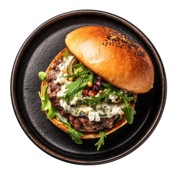 Top view of a delicious looking lamb burger on a dark dish isolated [Transparent Background PNG]