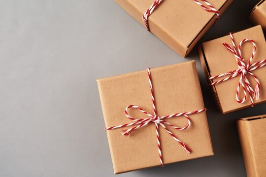 Parcel packaging setup with tied boxes on table