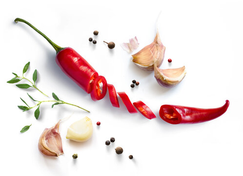 Fresh red chilli pepper and black pepper isolated on white background. Transparent background and natural transparent shadow; Ingredient, spice for cooking. collection for design