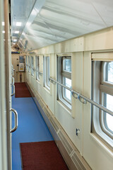 Obraz premium Interior of train car with many compartments, Train wagon inside