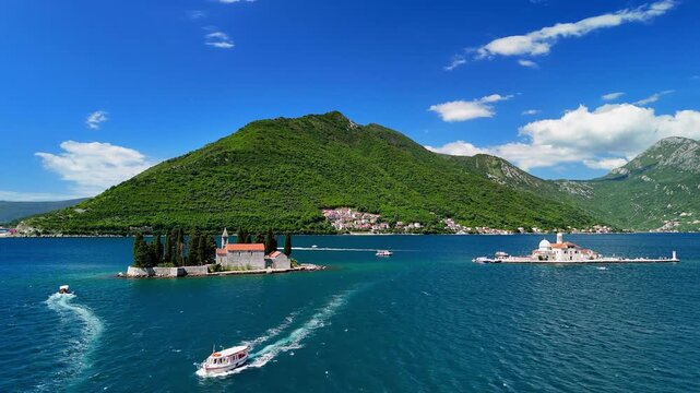 Aerial view of islands in the Bay of Kotor, featuring Our Lady of the Rocks Church and the Saint George Benedictine Monastery, Montenegro.
