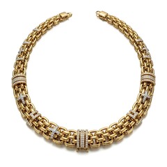 Obraz premium Elegant Gold Necklace with Diamond Accents - A Luxurious Jewelry Piece.