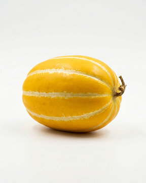 Korean Chamoe melon (Cucumis melo var. makuwa) on a white background