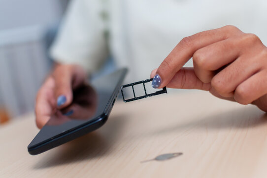 Exploring everyday life sim card insertion in mobile phones with close-up technology view