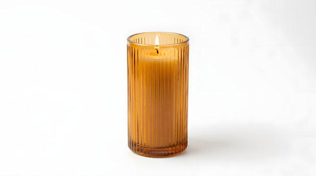 Elegant amber ribbed glass candle with a lit wick casting a soft, warm glow on a minimalist white backdrop, perfect for creating a serene and inviting ambiance