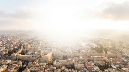 Obraz premium Aerial View of Jerusalem at Sunrise with Misty Horizon and Cityscape