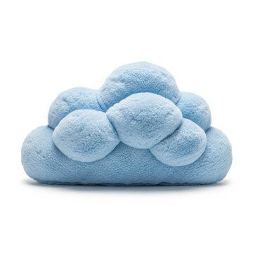 A blue cloud shaped pillow on a white background