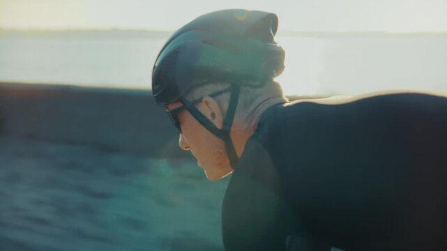 Cyclist Cycling Fast On Highway. Cyclist Participating In Road Racing. Competition On Highway