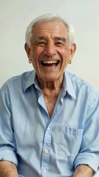 Close-up footage of the smiling old man, a collection of the old man's laughing expressions