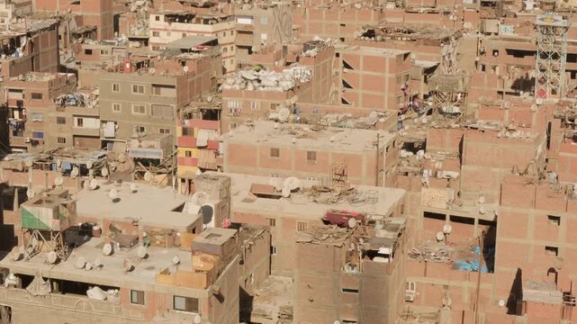 Houses with trash on roofs in Garbage City in Manshiyat Naser on outskirts of Cairo