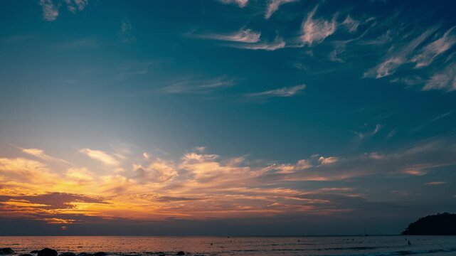 magical beautiful sunset on the beach. the sun dives into the golden waves. incredible sea landscape. Seascape, Summer and travel vacation concept