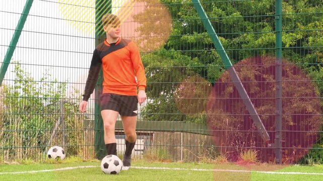 Male player tapping balls, signaling teammate, taking corner kick, overlays appearing around player
