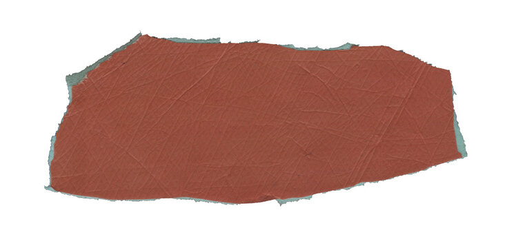 Torn Red Terracotta Foam Sheet Piece with Wavy Edges and Relief Texture Isolated