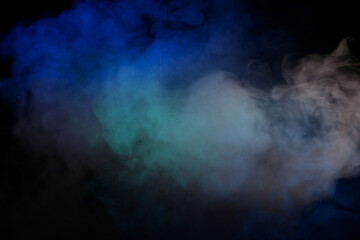 Obraz premium Blue and purple steam on a black background.