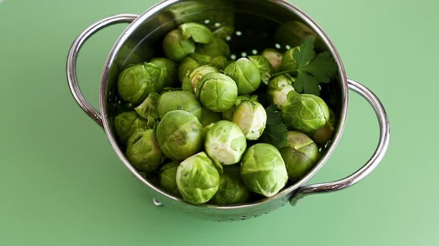 green Brussels sprouts in a colander