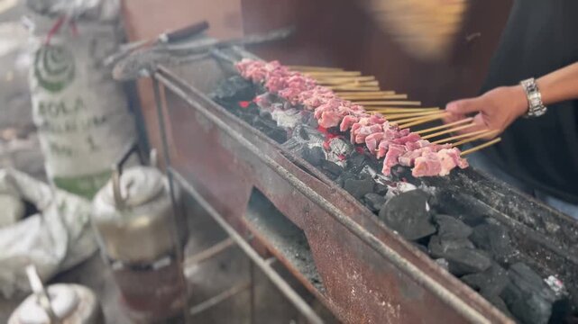 Indonesian food, Lamb satay on the charcoal grill in traditional market