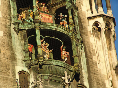 Munich, Germany - Detailed close up view of Glockenspiel mechanical clock on the City Hall Tower in Marienplatz famous attraction for the 32 life-size figures and the cooper's dance
