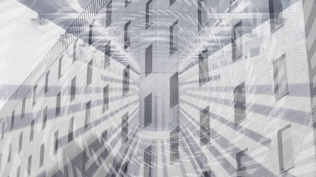 Facade showing pulsing spiral and radial overlay as frames progress, creating depth for design