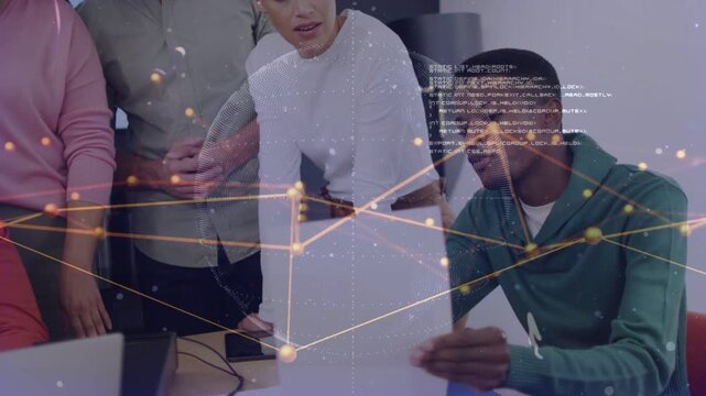 Seated man holding paper initiating tech data review with team, data overlay appearing over sheets