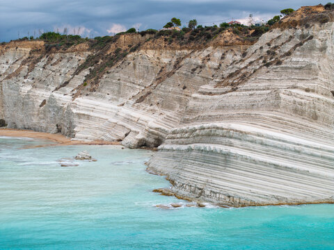 Scala dei Turchi, or the Turkish stairs in Sicily, Italy. Aerial Drone Shot. Unique White Rocks and Turquoise water.
