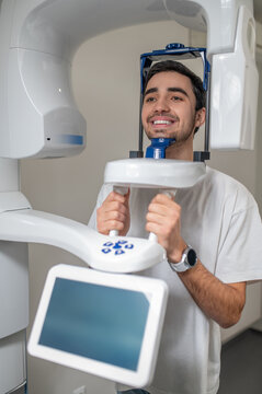 Male patient using dental cone beam computed tomography