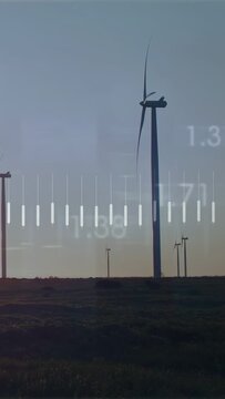 Vertical video: Wind-driven turbine rotating, equalizer bars pulsing and showing power data