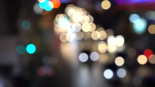 Blurred Defocused Lights of Traffic jam in city at night.