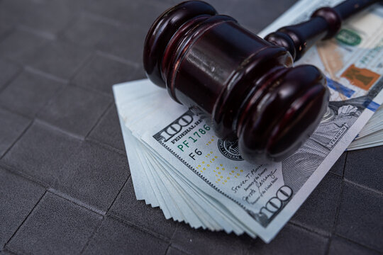 Judge Gavel On Dollar Banknotes Legal Financial Penalty And Court Decision Concept