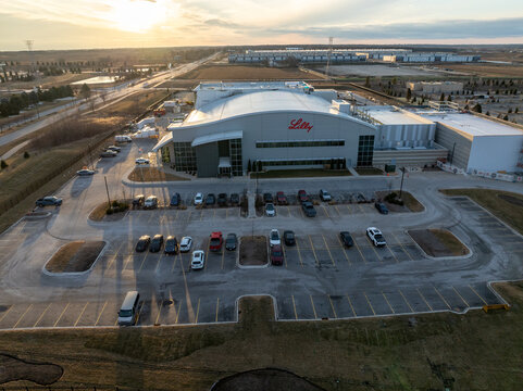 Aerial view of Eli Lilly and Company facility in Pleasant Prairie, Wisconsin, USA, on March 1, 2026, showing pharmaceutical manufacturing building, parking lot, and surrounding infrastructure.