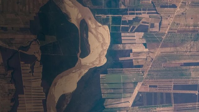 Aerial View Rio Grande River Bolivia Amazon Basin Farmland Grid Pattern Meander Landscape Elements of this video furnished by NASA