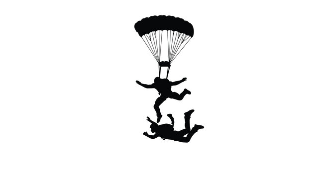 Silhouetted skydivers in freefall with an open parachute above