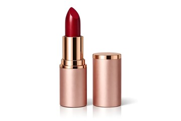 Obraz premium Elegant red lipstick in rose gold tube on white background