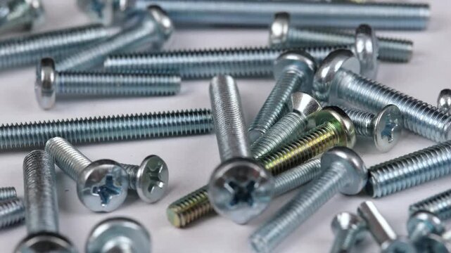 Metal screws for fastening equipment. Soft focus. Close-up. 