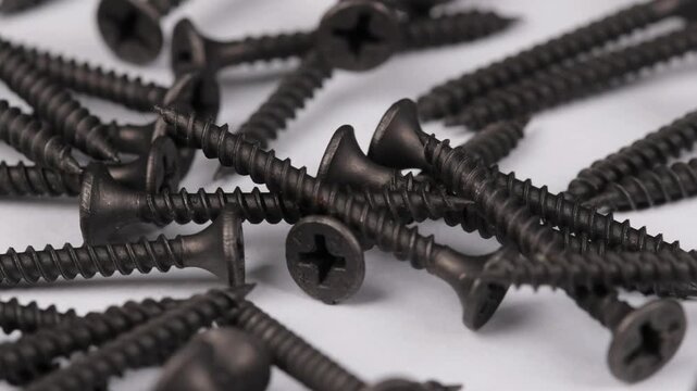 Metal screws for fastening equipment. Soft focus. Close-up. 