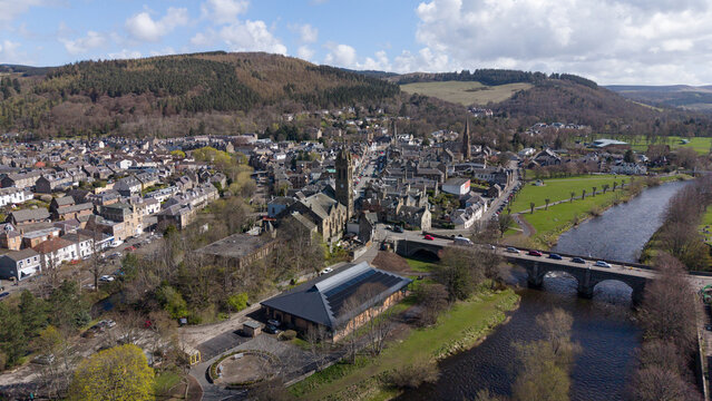 A detailed view of the historic architecture in the Scottish town of Peebles. The image showcases a beautiful array of traditional stone buildings and rooftops, highlighting the classic Scottish herit